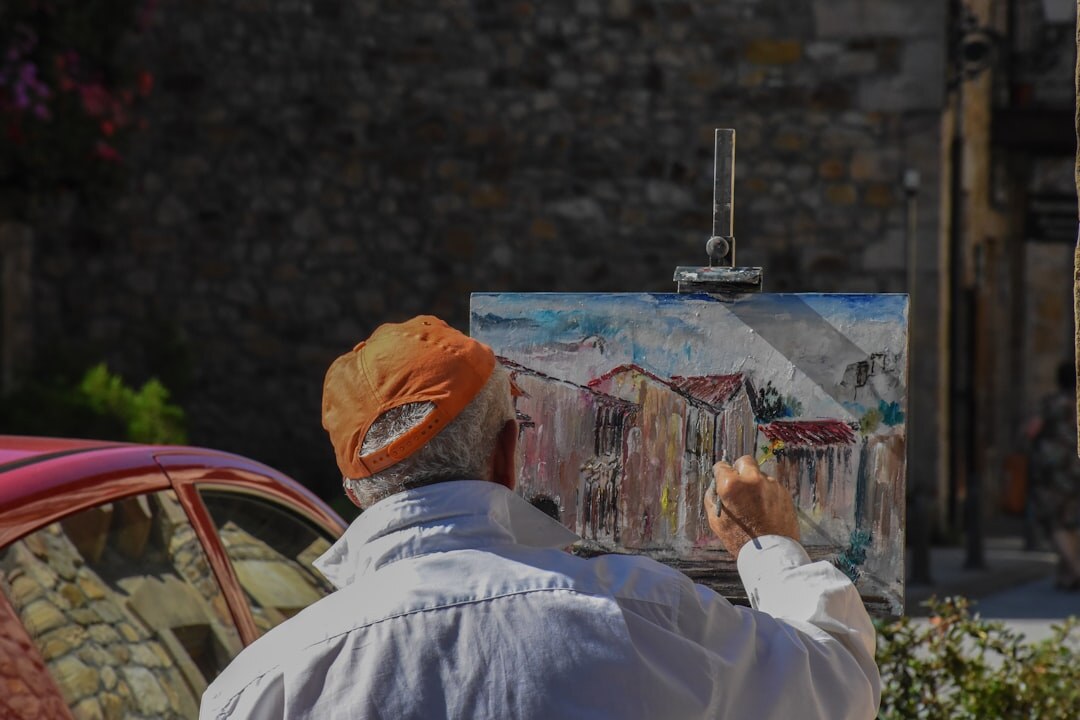 senior man painting